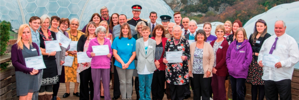 An image of a group of people stood holding certificates with Edward Bolitho at the Eden Project