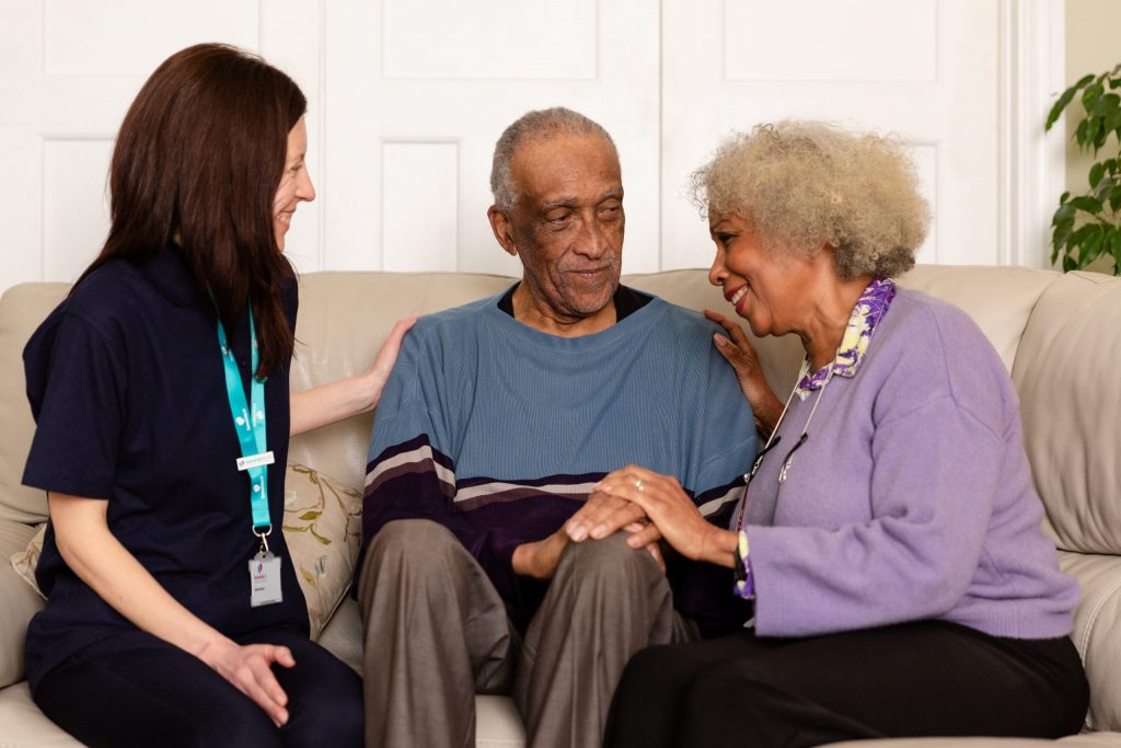 A picture of a Dementia nurse supporting family members