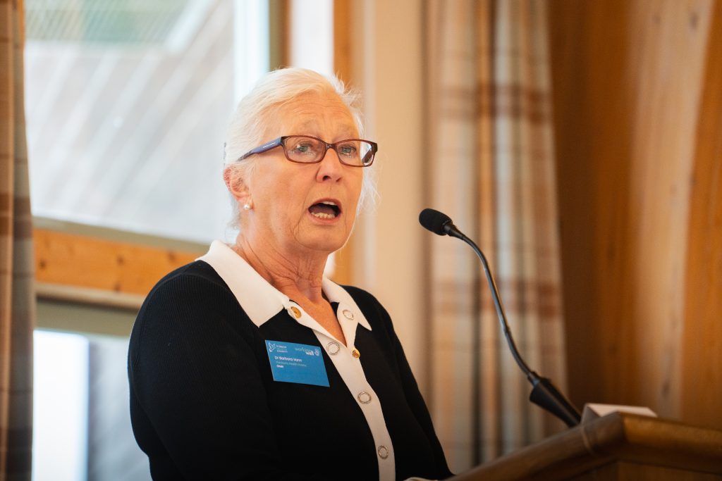 An image of Barbara Vann, Chair of Duchy Health Charity, speaking at a conference