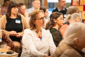 An image of people at a conference